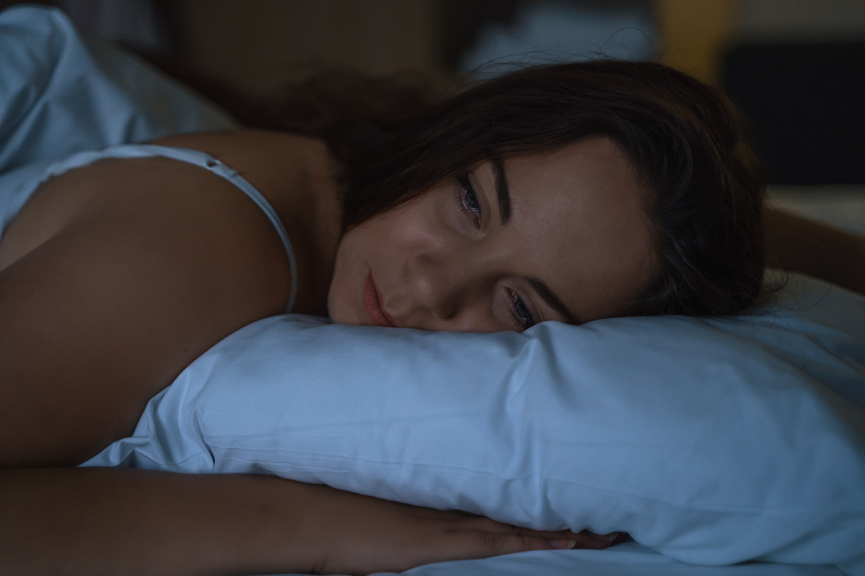 A woman experiencing insomnia